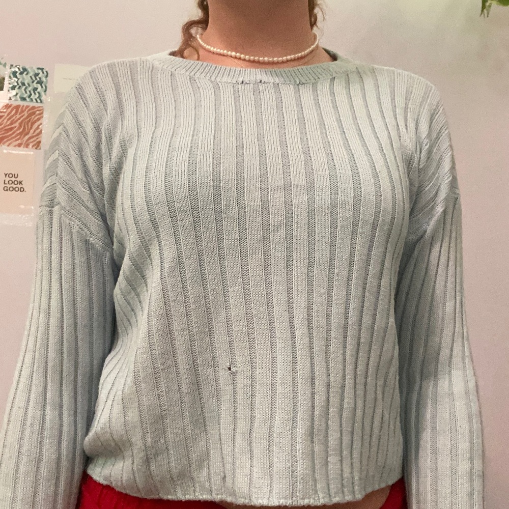 light blue sweater